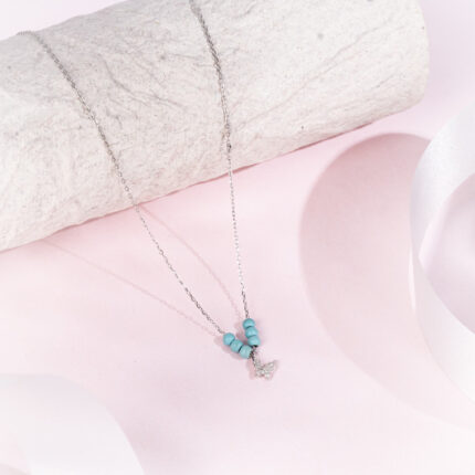 "Mystic Mermaid pendant on a delicate chain, inspired by ocean legends"