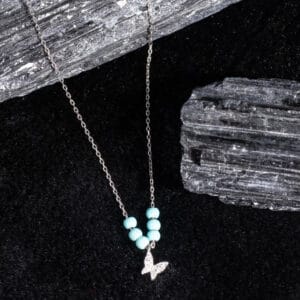 "Mystic Mermaid pendant on a delicate chain, inspired by ocean legends"