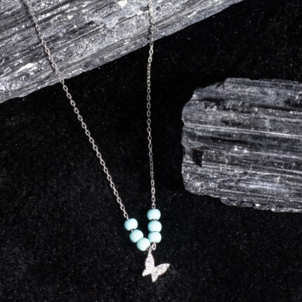"Mystic Mermaid pendant on a delicate chain, inspired by ocean legends"