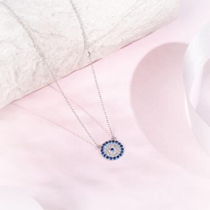 "Elegant evil eye necklace with a sapphire halo and silver chain"