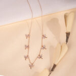 "Elegant butterfly pendant necklace in rose gold finish"