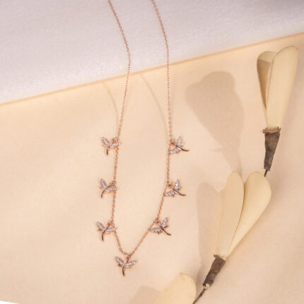 "Elegant butterfly pendant necklace in rose gold finish"