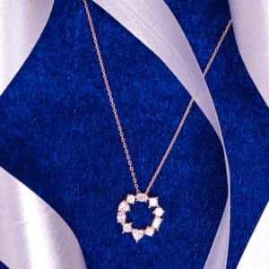 "Minimalist necklace featuring a sparkling round pendant in a classic design"