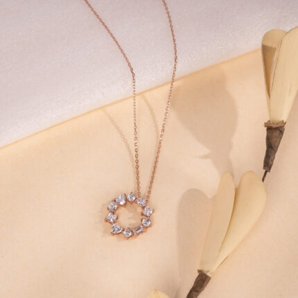 "Minimalist necklace featuring a sparkling round pendant in a classic design"