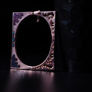 "Elegant bracelet with intricate carvings and vibrant multicolored beads"