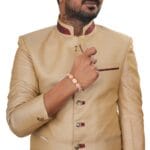 Om Shining Rakhi – Handwoven Thread with Silver & Stone Floral Charms - Image 6