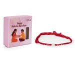 Sacred Red Wool Rakhi – Silver Coin Center with Threaded Accents - Image 4
