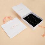 Gold Plated Necklace with Red Enamel Clover Accents - Image 6